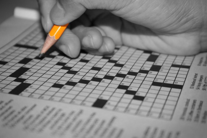 Reduces as a burden crossword